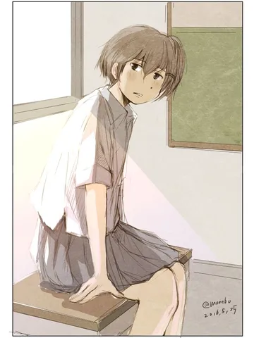 机に座っている。