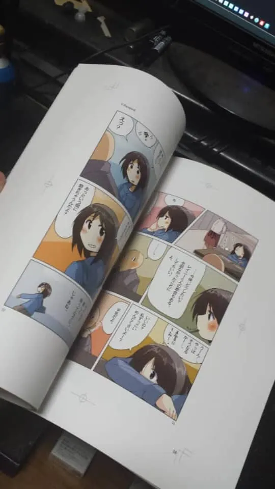 開かれたフルカラー漫画のページ