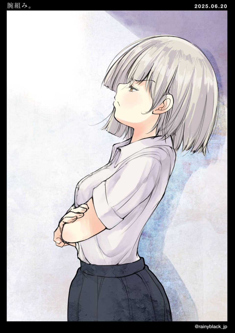 腕を組む女の子の横顔。