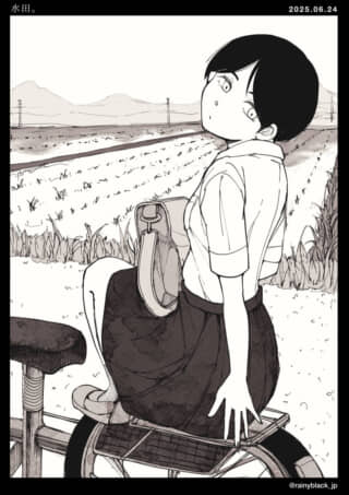 自転車に座る学生の少女
