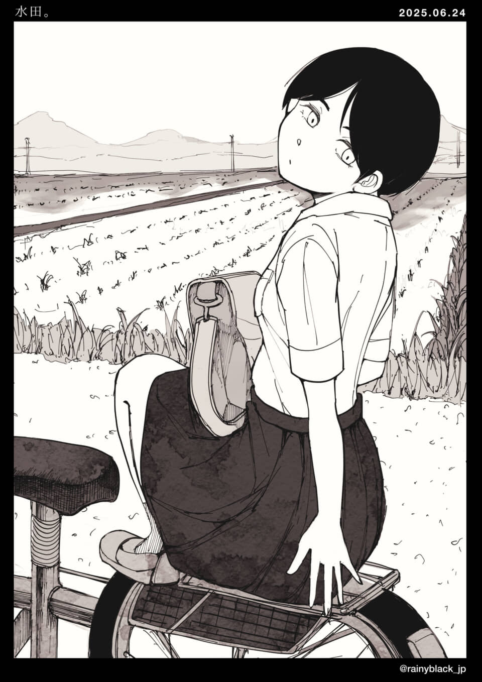 自転車に座る学生の少女