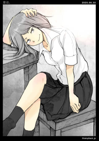机に寄りかかる女子学生。