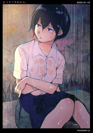 雨の中で佇む少女。