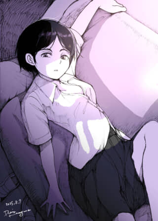 女性がベッドに横たわる。