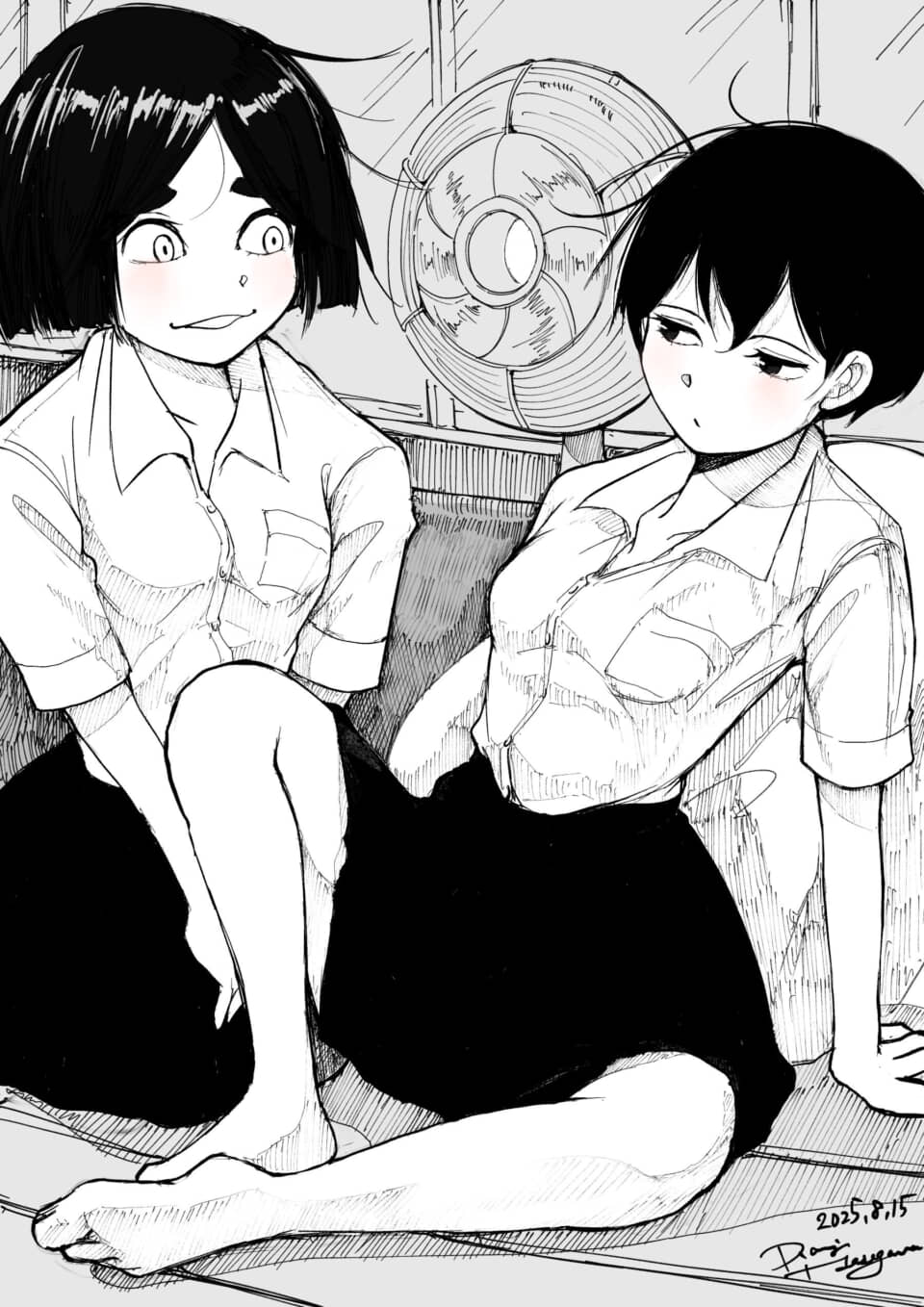 制服の少女二人が談笑中。