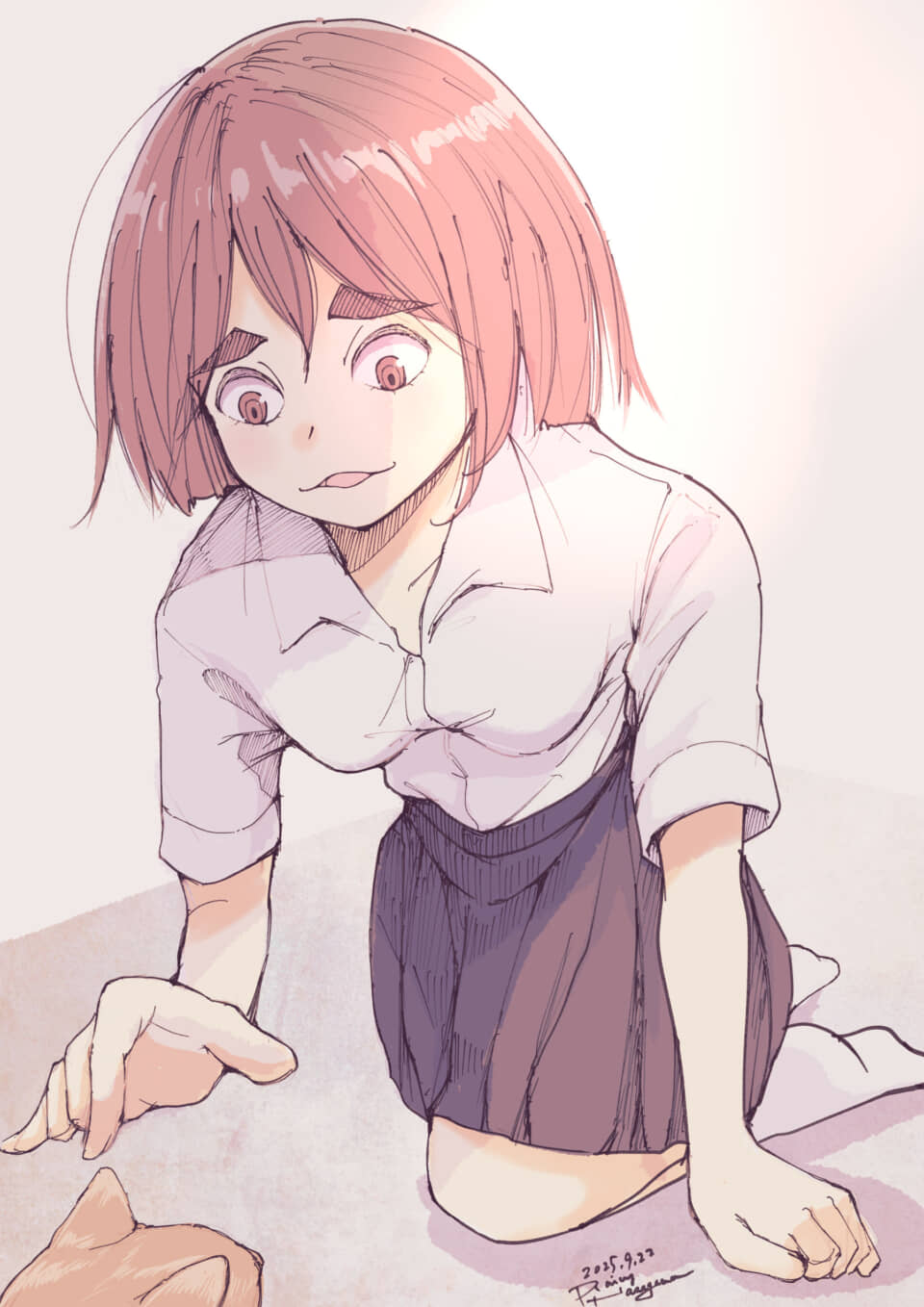 女の子が猫に興味津々で見つめる。