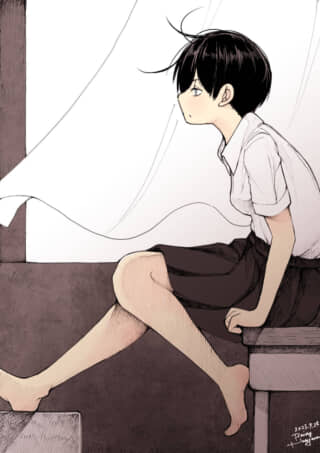 窓辺に座る少女。