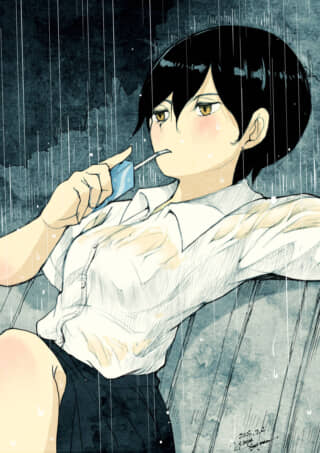 雨の中で休憩する女性。