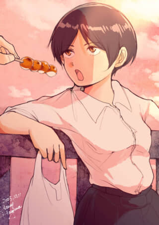 団子を食べようとしている人