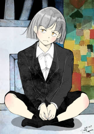 スーツ姿の座るキャラクター
