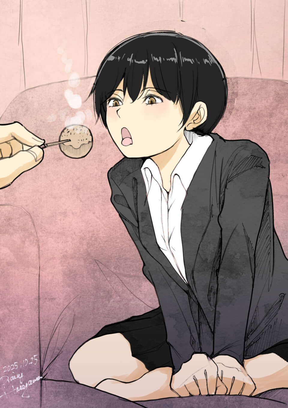 座る女性にお菓子を差し出す。