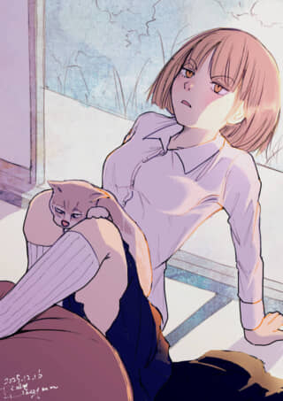 猫と少女が日向ぼっこ中。