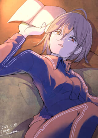 読書中のジャージ姿の女性