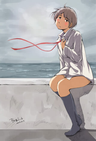 海辺で一人座る少女。